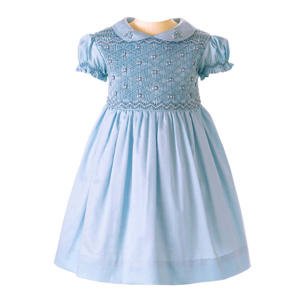 Babies blue dress with smocked bodice, embroidered with roses, peter pan collar and gathered skirt.